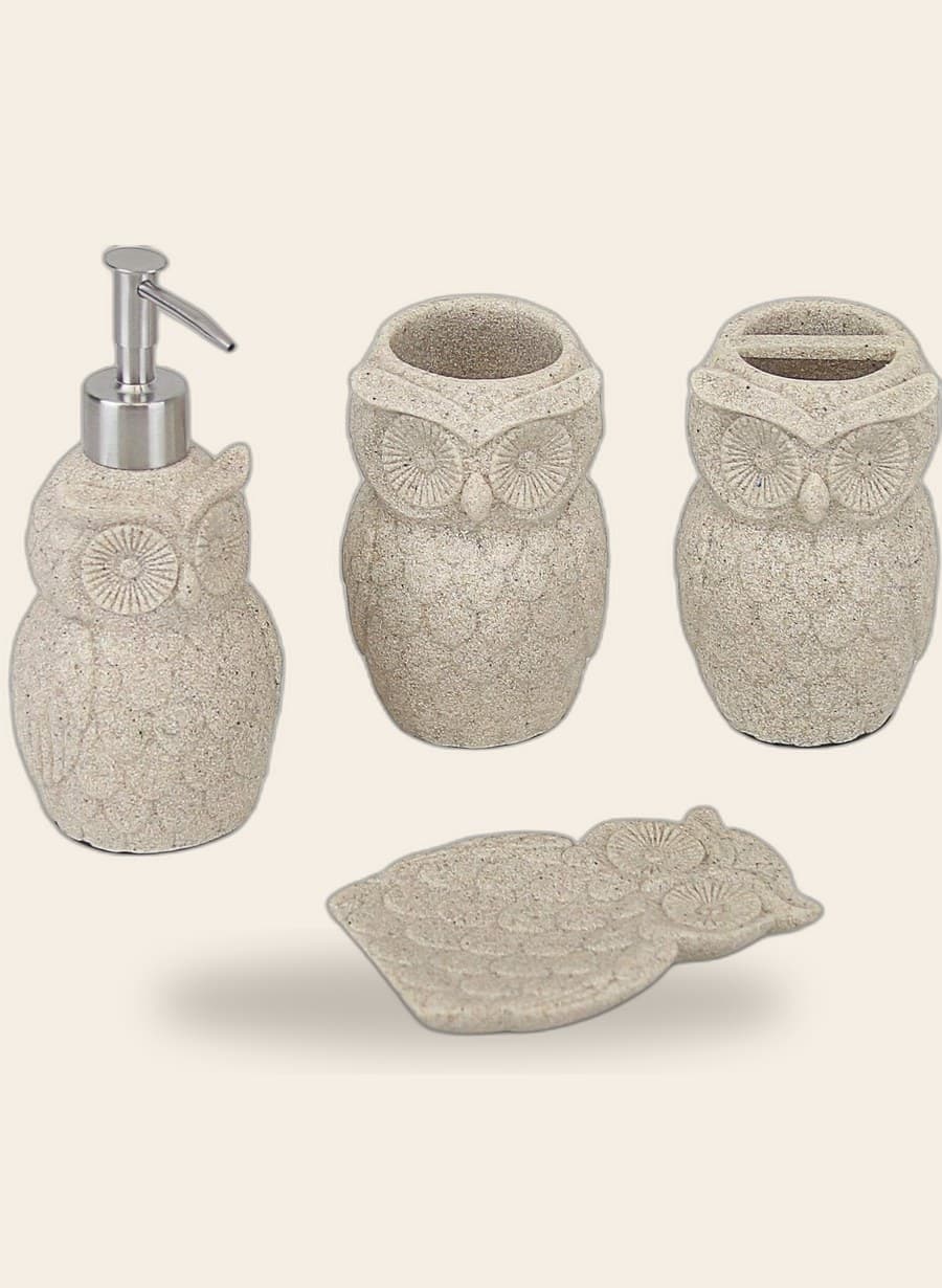 Sandstone-look owl bath accessories on a warm cream background
