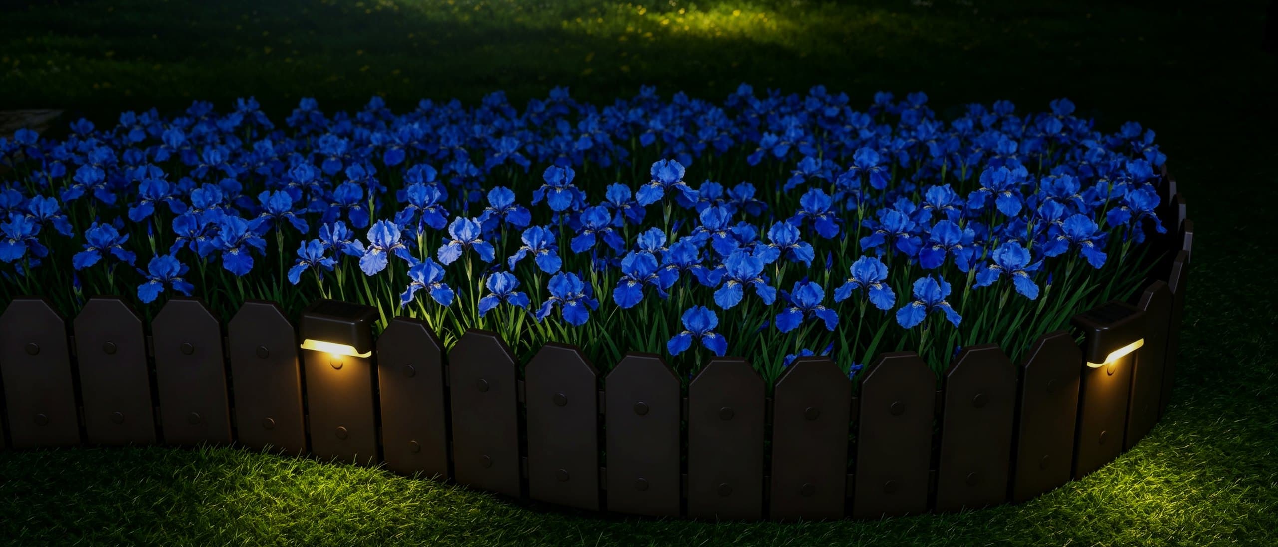 Evelyne solar garden fencing around a bed of blue irises, day and night